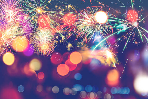 istock Background festive New Year with fireworks and bokeh. blur 1064273522
