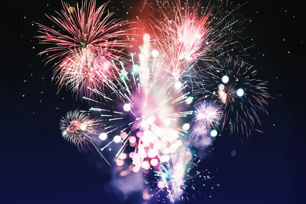 istock Background festive New Year with fireworks and bokeh. 1064273896