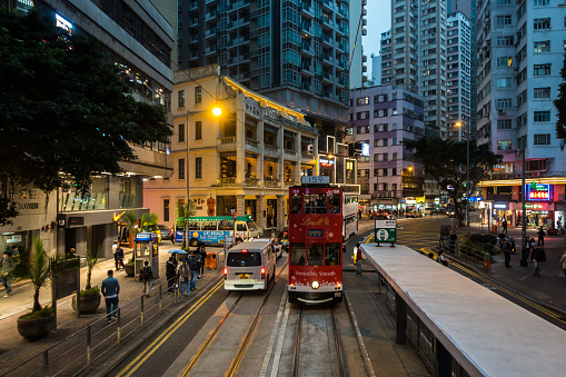 Double-decker tram (Ding Ding) at Hennessy Road in Wan Chai district. Hong Kong, January 2018