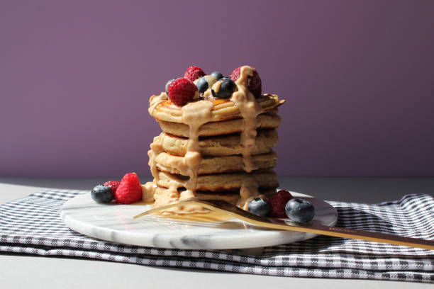 istock Pancakes with fruits and peanut butter 1064274070