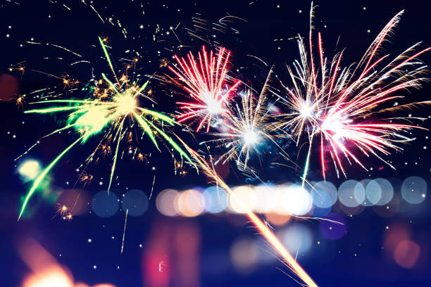 istock Background festive New Year with fireworks and bokeh. 1064274186