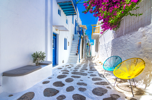 View of the famous pictorial narrow streets of Mykonos town in Mykonos island, Greece on July 20, 2018.