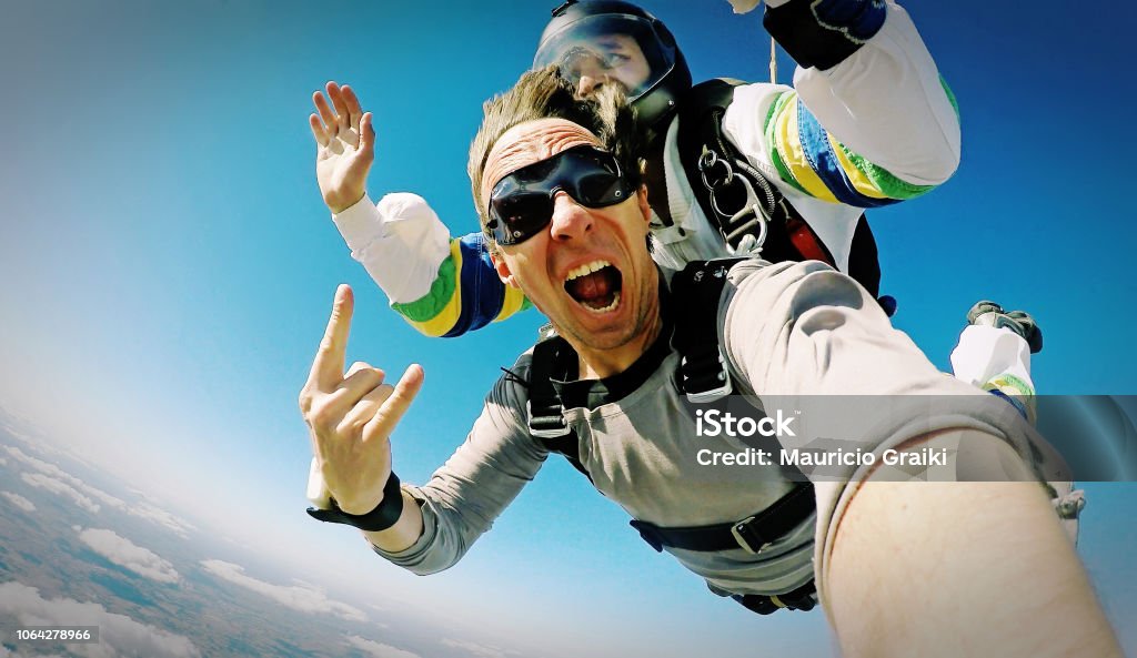 Skydive tandem selfie photo effect Skydiving shot with small camera Skydiving Stock Photo