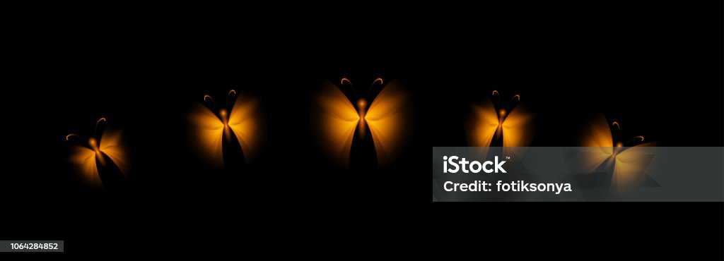 Shining golden butterflies on a black background. Set of Shining golden butterflies on a black background. Stylized insects for decoration. Abstract stock illustration