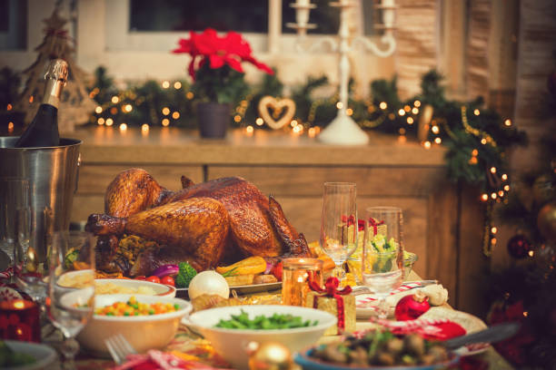 istock Traditional Stuffed Christmas Turkey with Side Dishes 1064287884