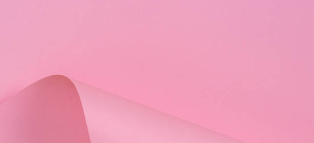 istock Abstract geometric shape pink color paper background 1064288928