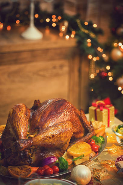istock Traditional Stuffed Christmas Turkey with Side Dishes 1064288966