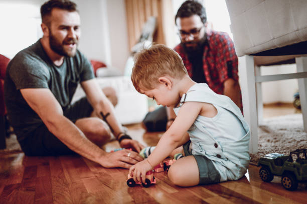 nostro figlio, il nostro orgoglio - block togetherness happiness indoors foto e immagini stock