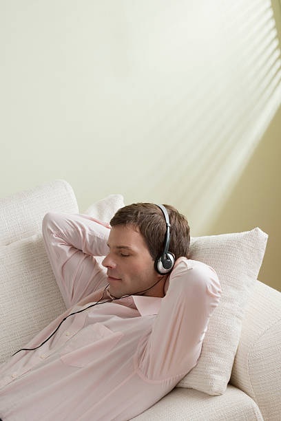 istock Young man listening to music 106429170