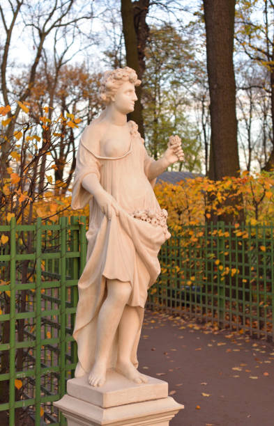 istock Statue of goddess Flora in Summer Garden. 1064291914