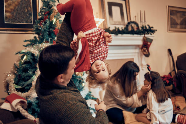 istock playful young family enjoying Christmas 1064299314