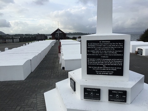 Rotorua, New Zealand - February 15th, 2016: The Muruika Urupa or Soldiers’ Cemetery stands on Muruika Point near St Faith’s Anglican Church on the edge of Lake Rotorua.