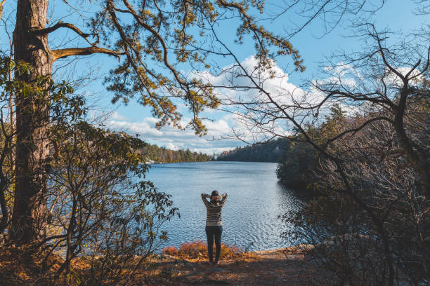 istock Woman walking on trail in autumn 1064302380