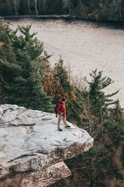 istock Man at the edge of a cliff 1064303966