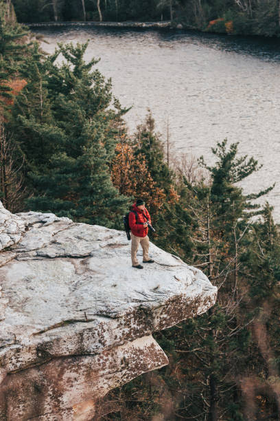 istock Man at the edge of a cliff 1064304000