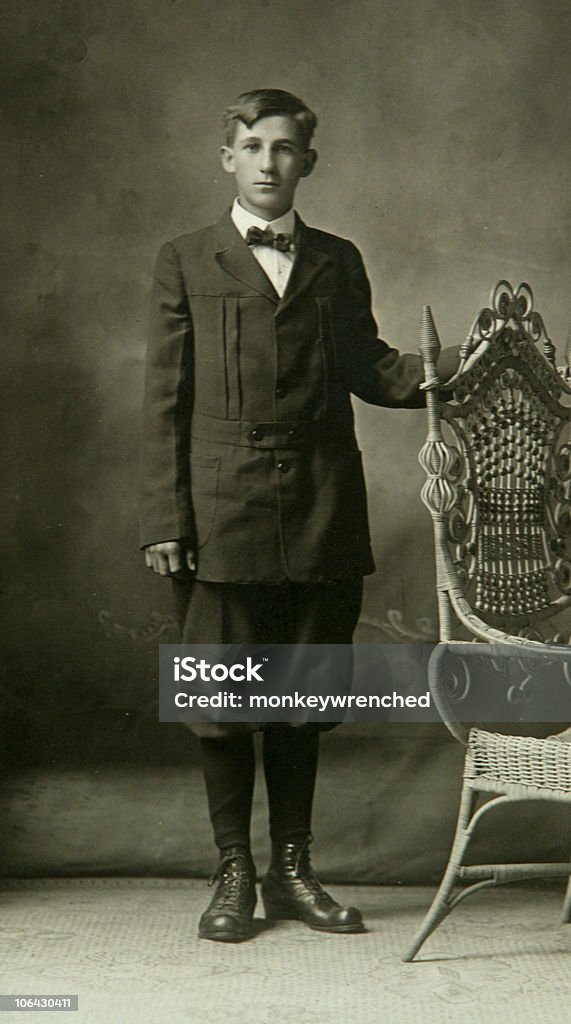 antique photograph of young boy in bloomers  Photography Stock Photo