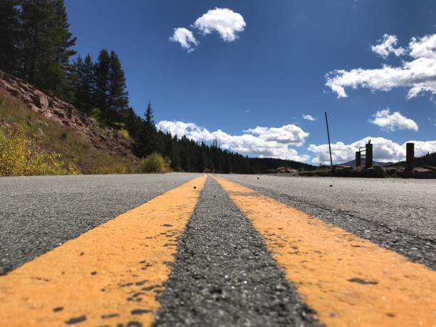 istock Converging Country Road 1064304226