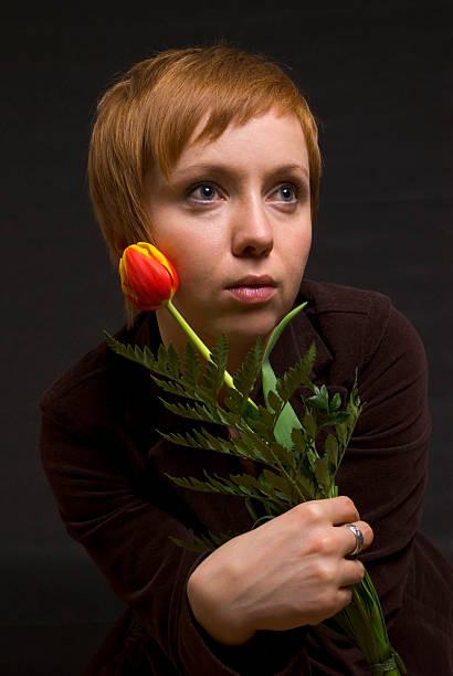 istock Girl with tulip 106430640