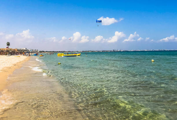 Beach activities on the sea. Coastal landscape