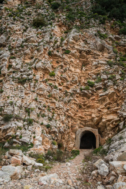 istock Tunnel cut out inside the rock 1064307238