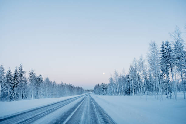 Frozen winter road in Finland stock photo