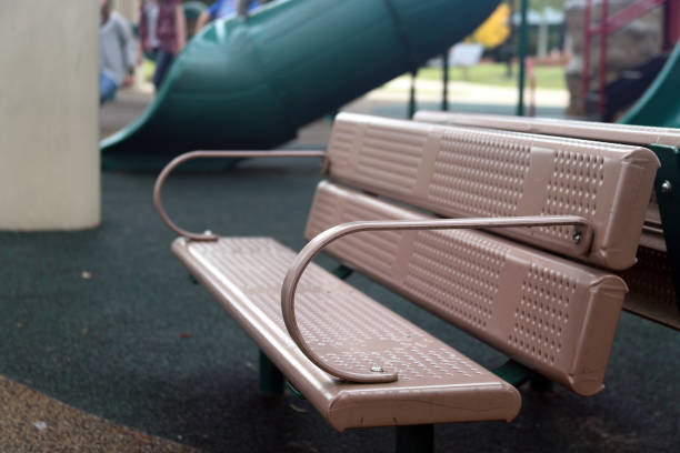 istock Black Bench seat at playground 1064309742