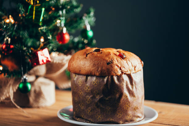 istock Christmas cake panettone and Christmas decorations. 1064310246