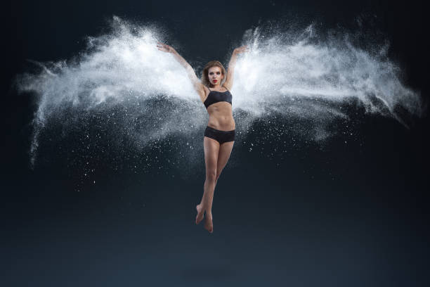 istock Young woman with powder wings 1064315174
