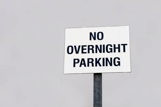 istock No overnight parking sign 1064319104