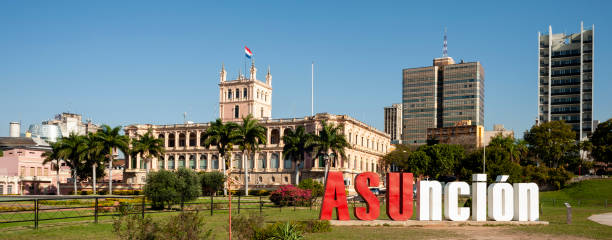 Asuncion sign with palace in the background. Asuncion sign with palace in the background. paraguay stock pictures, royalty-free photos & images