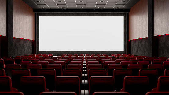Cinema with Red Seats and Blank Screen
