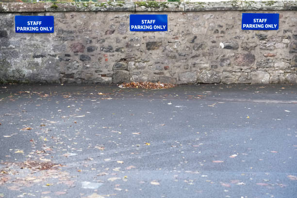 istock Staff parking only sign in car park 1064326960