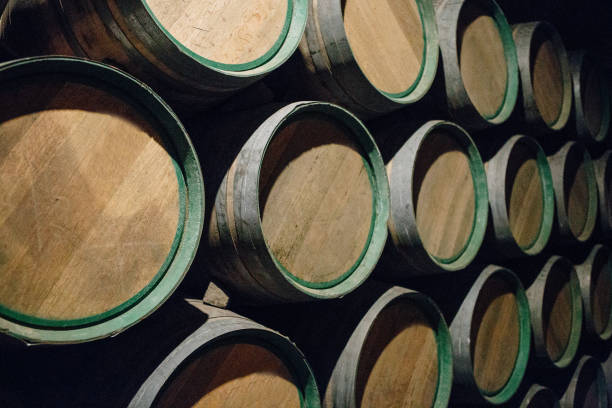 istock Wooden wine barrels stacked 1064327744