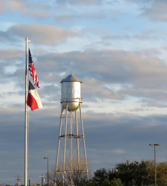 istock water tower & flags-- USA & Texas, copy space 1064330622