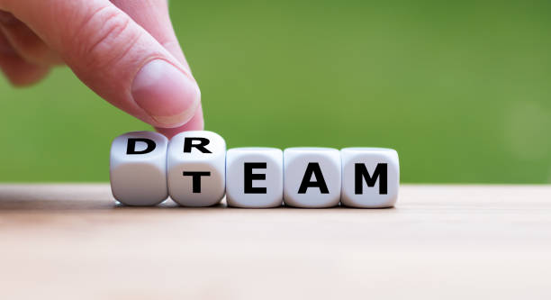 istock Hand is turning a dice and changes the word 