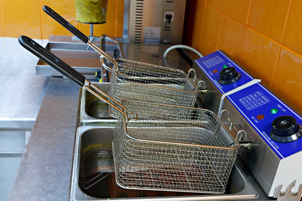 istock A device for cooking potatoes and meat in deep-fried. 1064332558