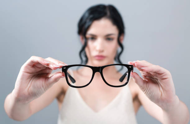 istock Young woman with eye glasses 1064344234