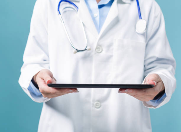 istock Medical doctor with digital tablet 1064344294