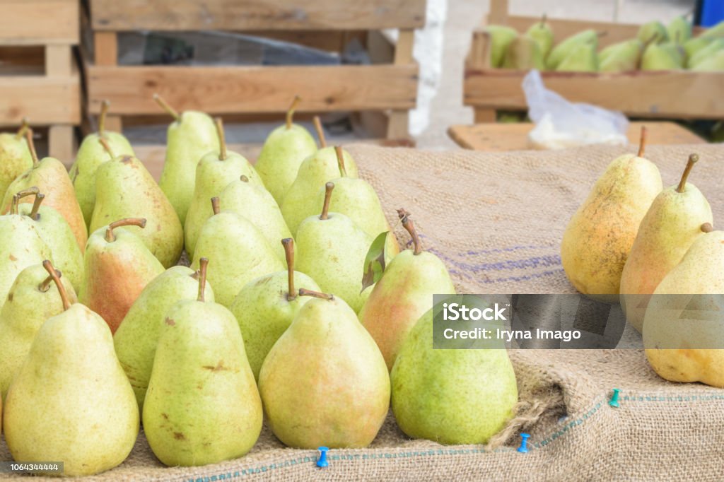 Healthy Organic Yellow Pears On The Table With Burlap At Village
