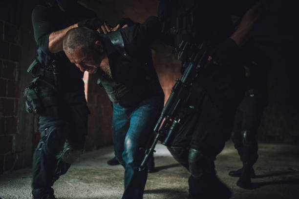 istock SWAT Arresting Gangster 1064345168