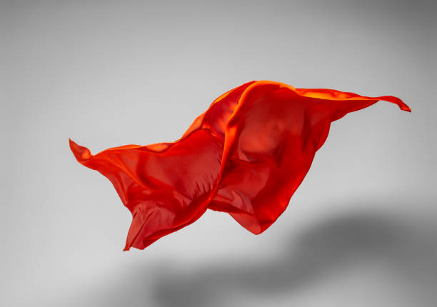 istock abstract orange fabric in motion 1064347860