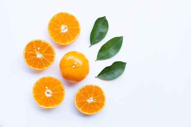 istock Fresh orange citrus fruit with leaves isolated on white background.  Top view 1064352404