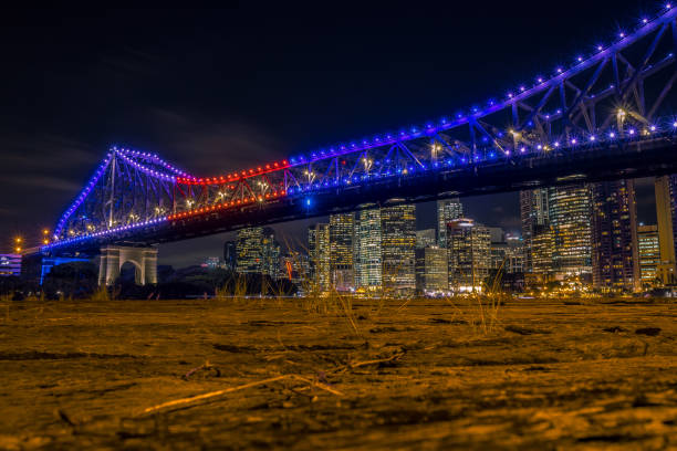 istock Bright illumination of city bridge in night 1064353498