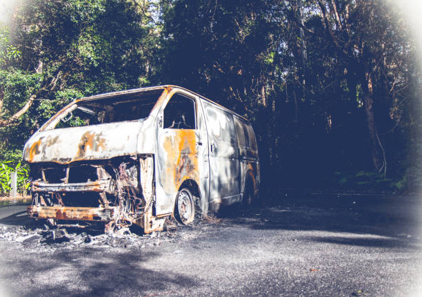 istock Wrecked old vehicle on forest road 1064353622