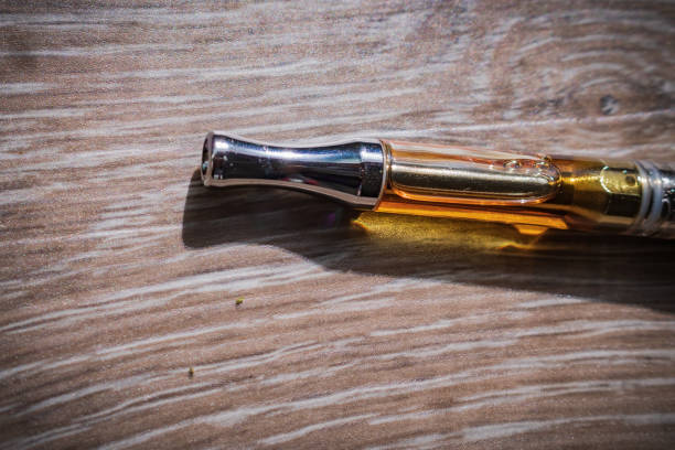 istock THC oil filled vape cartridge 1064353792