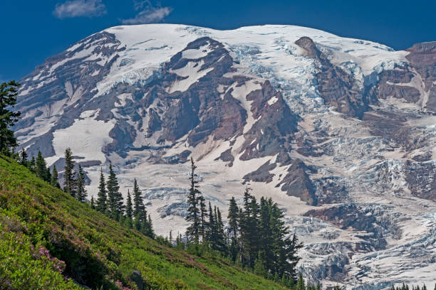 istock Glaciated Mountain Looming Above the Ridge 1064357856
