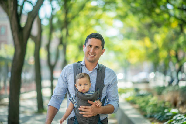 istock Single dad walking with a baby 1064375008