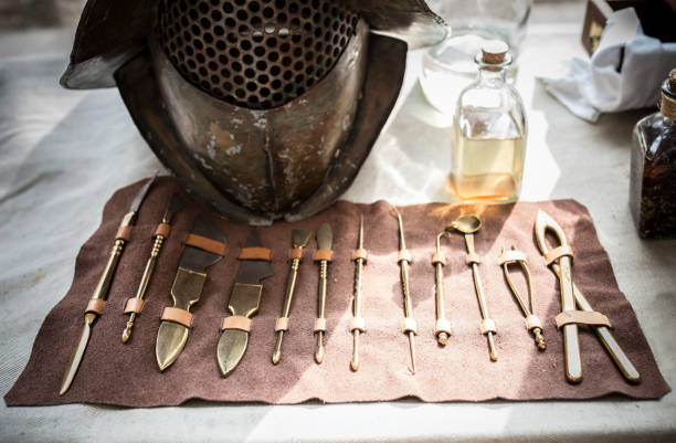 Surgical instruments in Ancient Rome for gladiators treatment Surgical instruments in Ancient Rome for gladiators treatment. Historical reconstruction leather care stock pictures, royalty-free photos & images
