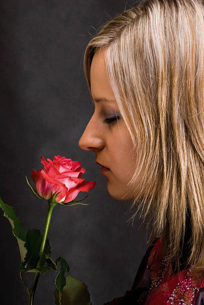 istock Girl with rose portrait 106438007