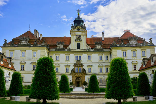 Valtice, Czech Republic - May 16, 2018: Baroque Castle in Valtice, Moravia, Czech Republic. View of the buildings of the palace complex. This Palace is listed as a UNESCO cultural heritage site